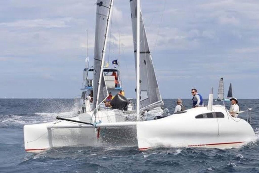 Sailing Prescott Firefly 850 catamaran on open sea