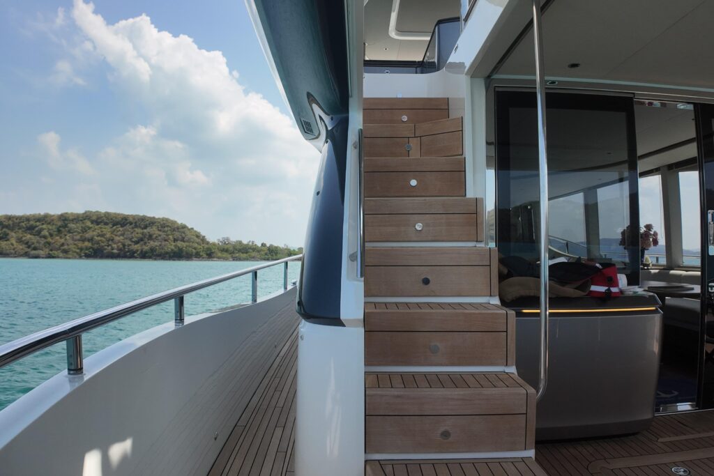 Yacht steps leading inside, with ocean view. La Mer.