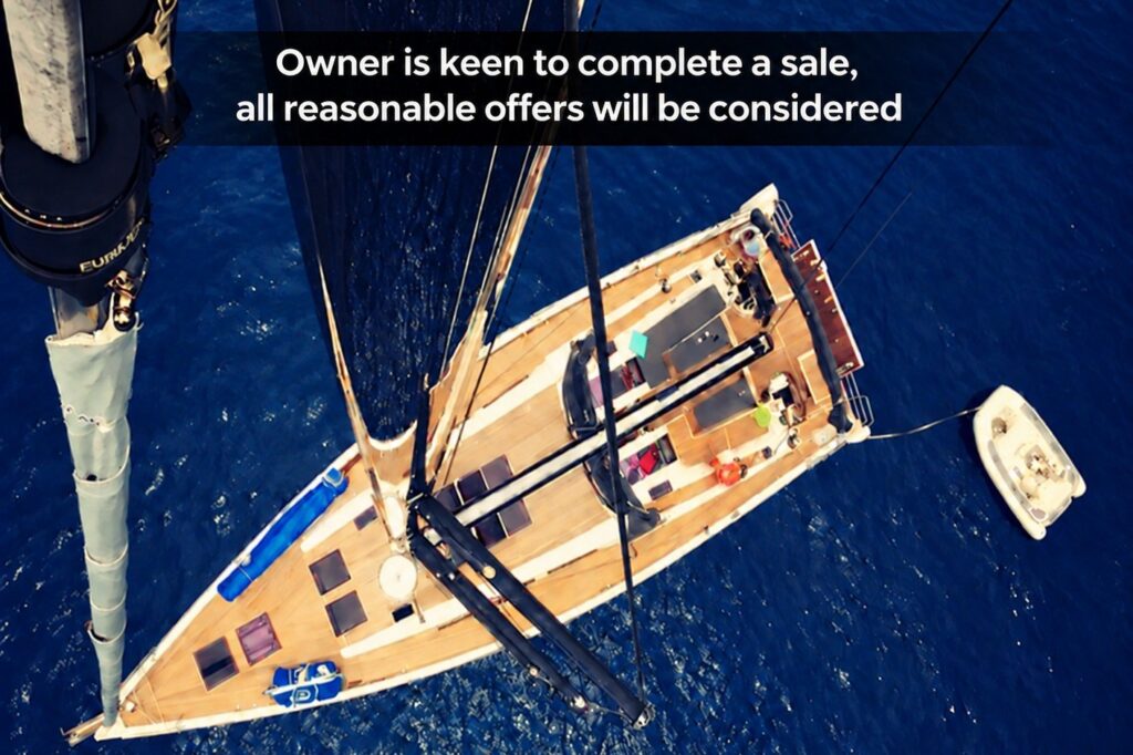 Aerial view of 2014 Hanse 575 yacht on blue ocean